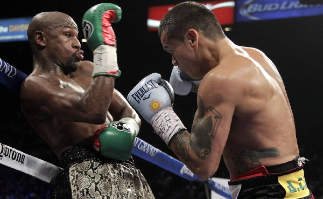 Floyd Mayweather, con cátedra de atletismo, venció a Maidana