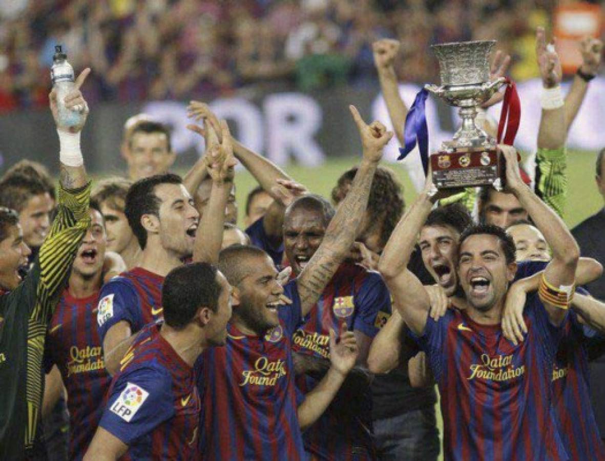 Las mejores 15 fotos inolvidables de Xavi Hernández en el Barcelona