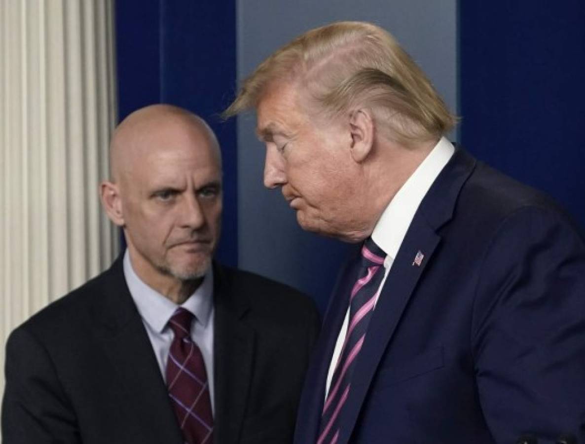 WASHINGTON, DC - APRIL 24: U.S. President Donald Trump and Stephen Hahn, Director of the Food and Drug Administration participate in the daily coronavirus task force briefing at the White House on April 24, 2020 in Washington, DC. Earlier on Friday, President Trump signed into law the Paycheck Protection Program and Health Care Enhancement Act, a $484 billion bill that aids small businesses and hospitals under stress from the coronavirus pandemic. Drew Angerer/Getty Images/AFP