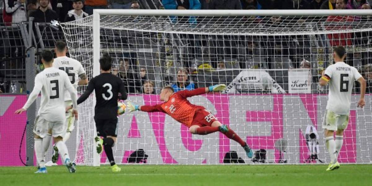 Germany's goalkeeper Marc-Andre Ter Stegen fails to save the 2-2 goal during the friendly football match Germnay v Argentina at the Signal-Iduna Park in Dortmund, western Germany on October 9, 2019. (Photo by Ina FASSBENDER / AFP)