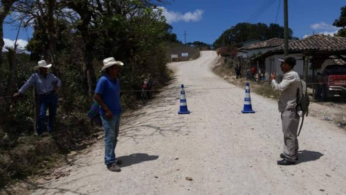 ¡Palos, piedras y tractor! Las medidas de pueblos de Honduras para evitar el coronavirus