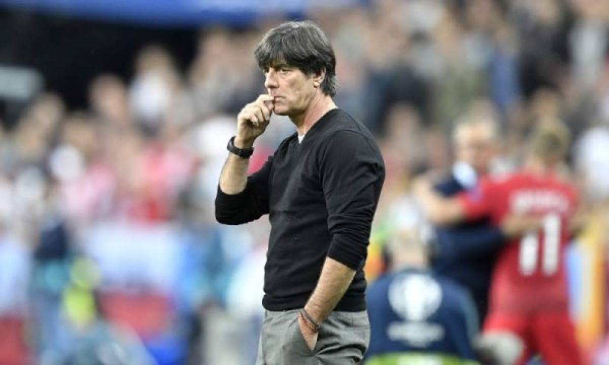 Germany coach Joachim Loew looks on from the sidelines during the Euro 2016 Group C soccer match between Germany and Poland at the Stade de France in Saint-Denis, north of Paris, France, Thursday, June 16, 2016. (AP Photo/Martin Meissner) ORG XMIT: PW173