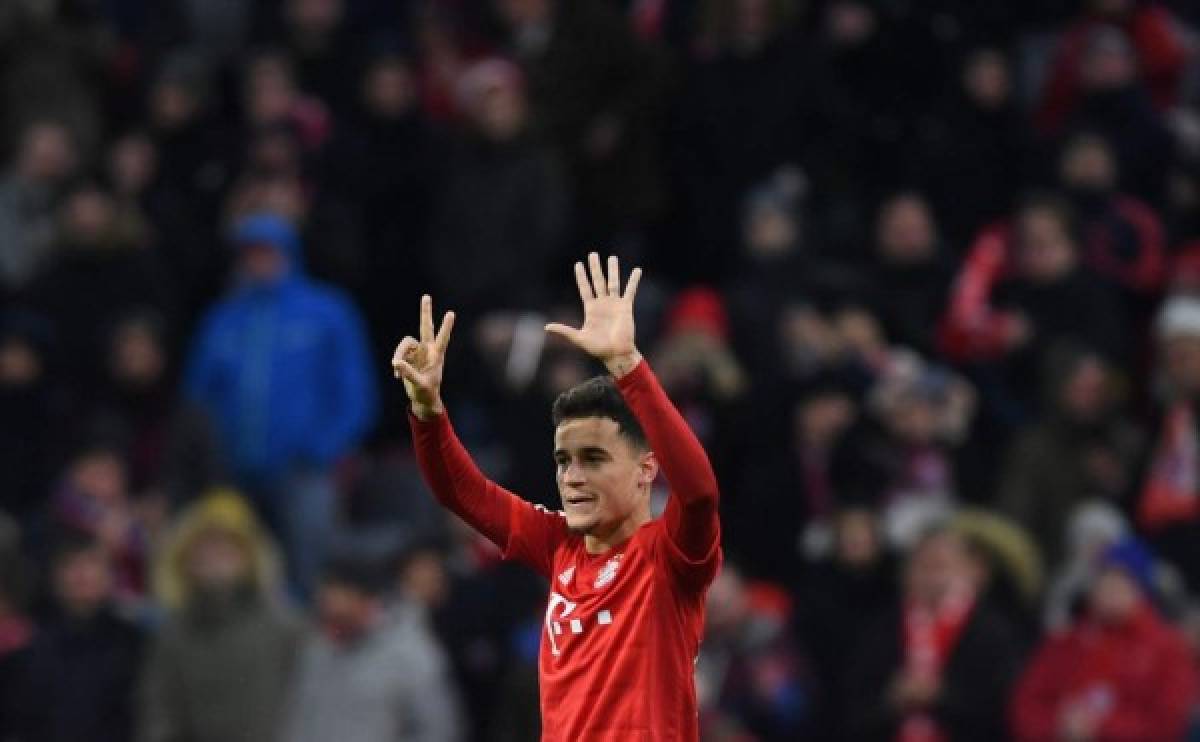 Bayern Munich's Brazilian midfielder Philippe Coutinho reacts after his third goal for Munich during the German first division Bundesliga football match Bayern Munich v Werder Bremen in Munich on December 14, 2019. (Photo by Christof STACHE / AFP) / DFL REGULATIONS PROHIBIT ANY USE OF PHOTOGRAPHS AS IMAGE SEQUENCES AND/OR QUASI-VIDEO