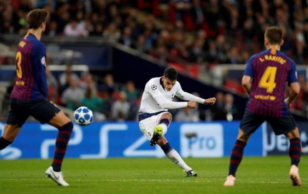 Tottenham Hotspur's Argentinian midfielder Erik Lamela scores his team's second goal during the Champions League group B football match match between Tottenham Hotspur and Barcelona at Wembley Stadium in London, on October 3, 2018. / AFP PHOTO / Adrian DENNIS