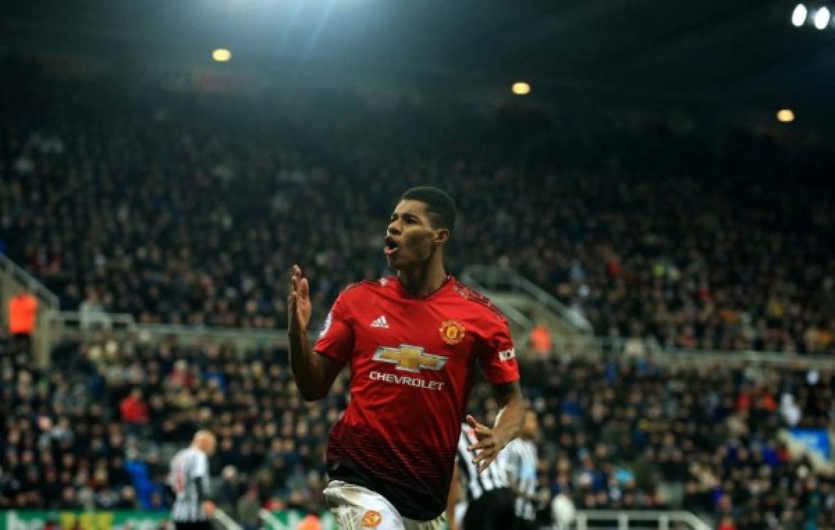 Manchester United's English striker Marcus Rashford celebrates scoring his team's second goal during the English Premier League football match between Newcastle United and Manchester United at St James' Park in Newcastle-upon-Tyne, north east England on January 2, 2019. (Photo by Lindsey PARNABY / AFP) / RESTRICTED TO EDITORIAL USE. No use with unauthorized audio, video, data, fixture lists, club/league logos or 'live' services. Online in-match use limited to 120 images. An additional 40 images may be used in extra time. No video emulation. Social media in-match use limited to 120 images. An additional 40 images may be used in extra time. No use in betting publications, games or single club/league/player publications. /