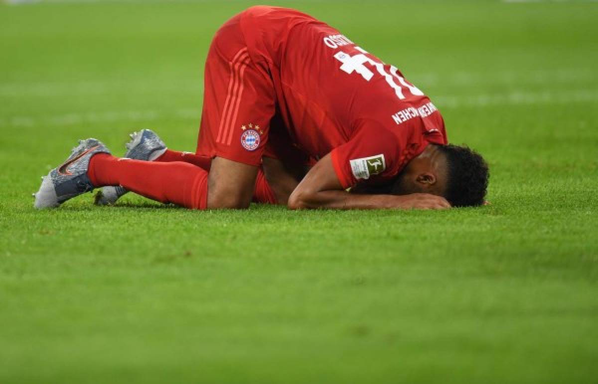 Bayern Munich's French midfielder Corentin Tolisso reacts after a foul during the German First division Bundesliga football match FC Bayern Munich v Hertha Berlin in Munich, southern Germany, on August 16, 2019. (Photo by Christof STACHE / AFP) / DFL REGULATIONS PROHIBIT ANY USE OF PHOTOGRAPHS AS IMAGE SEQUENCES AND/OR QUASI-VIDEO
