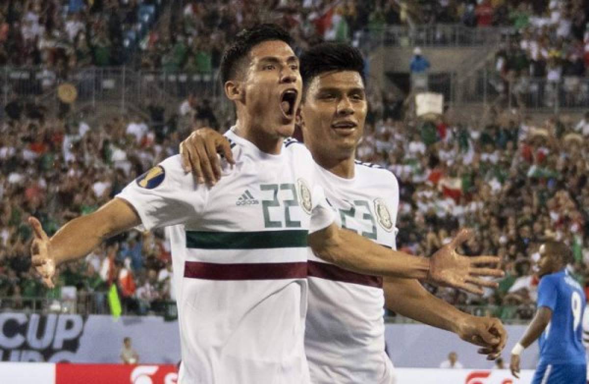 Mexico's Uriel Antuna (R) celebrates after scoring against Martinique during their CONCACAF Gold Cup group stage football match at Bank of America Stadium in Charlotte, North Carolina, on June 23, 2019. (Photo by Jim WATSON / AFP)