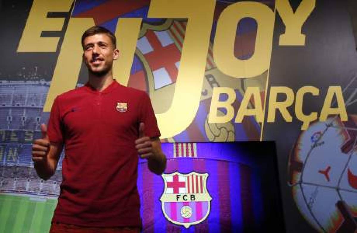 French soccer player Clement Lenglet poses for media in a FC Barcelona's shop next to Camp Nou stadium in Barcelona, Spain, Thursday, July 12, 2018. Lenglet has agreed a five-year deal. (AP Photo/Manu Fernandez)
