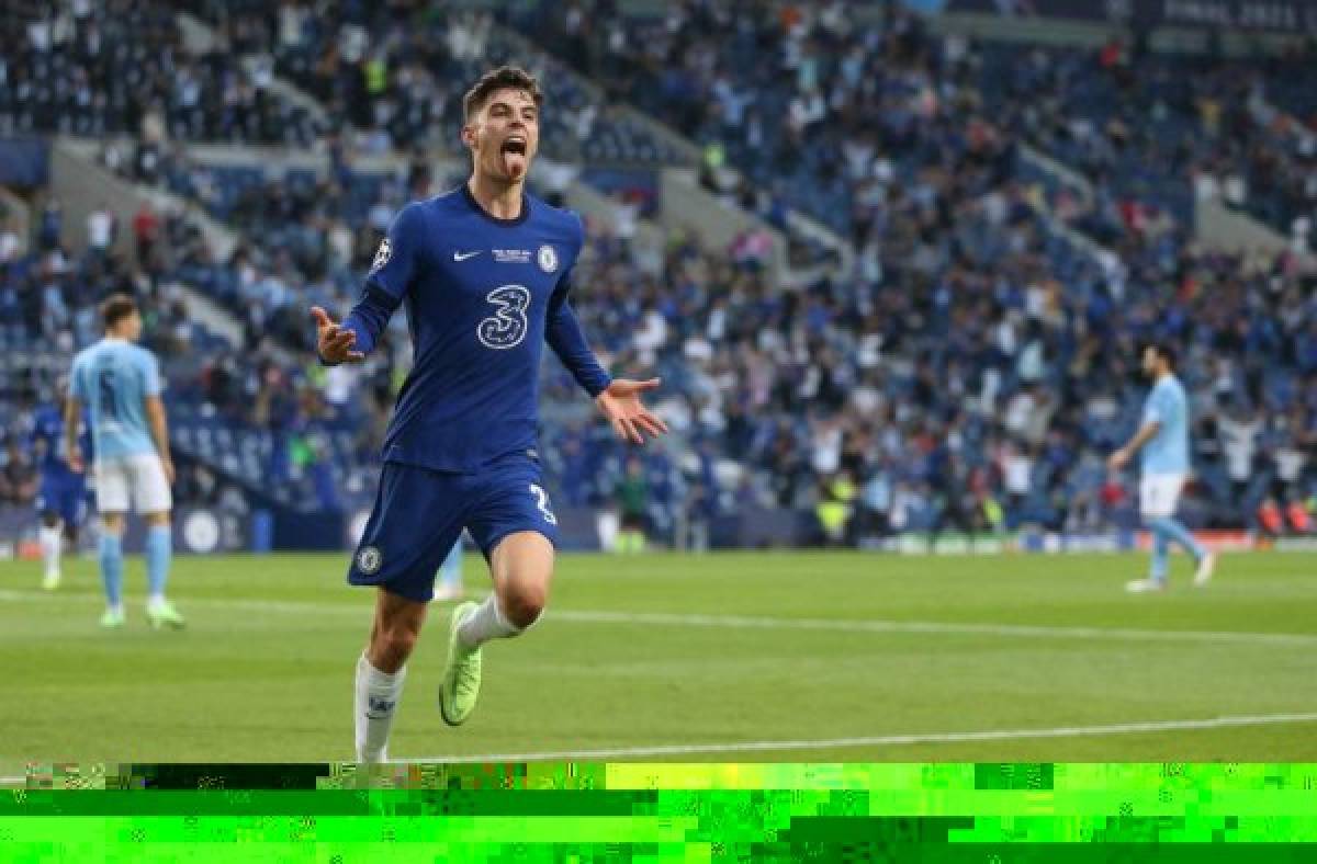 Chelsea's German midfielder Kai Havertz celebrates after scoring his team's first goal during the UEFA Champions League final football match between Manchester City and Chelsea FC at the Dragao stadium in Porto on May 29, 2021. (Photo by Jose Coelho / POOL / AFP)