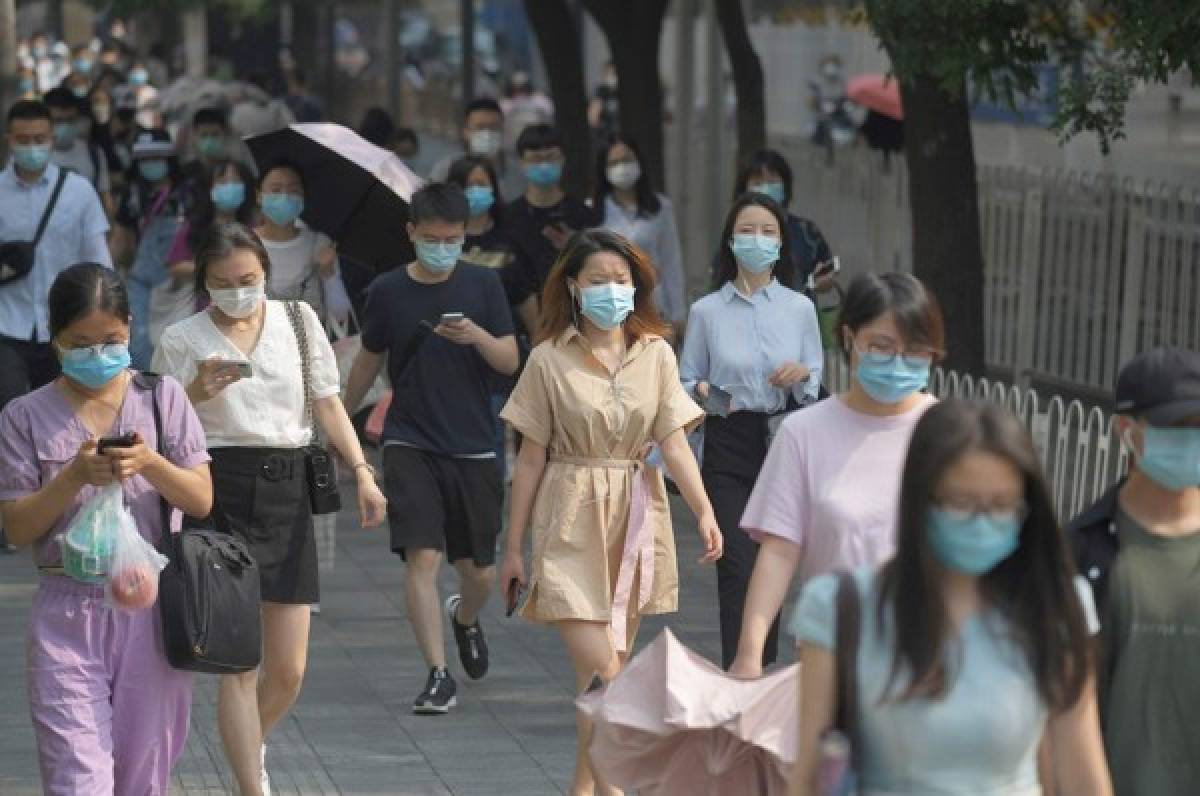 Autoridades chinas confinan a medio millón de personas cerca de Pekín por el coronavirus