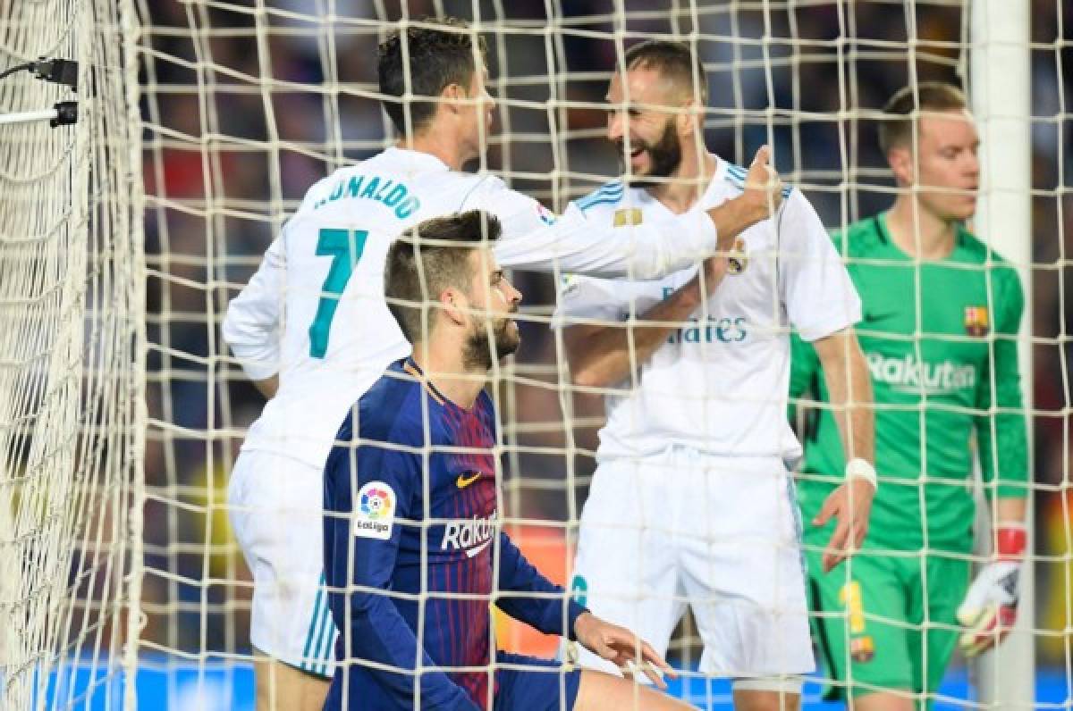 Cristiano Ronaldo anotó, pero se llevó un golpe de Gerard Piqué que quiso anticiparlo.