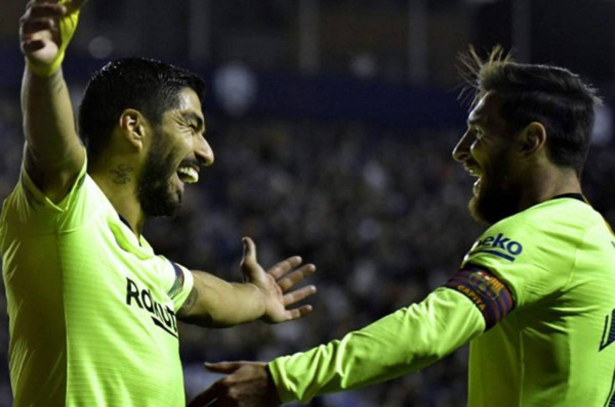 Suárez y Messi celebrando el tanto del uruguayo ante el Valencia.