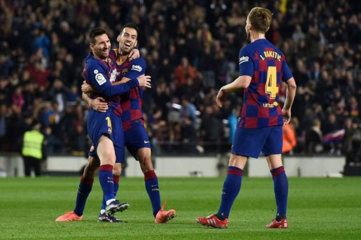 Griezmann y Messi tienen ganando al Barcelona ante el Mallorca en el Camp Nou. FOTO: AFP.