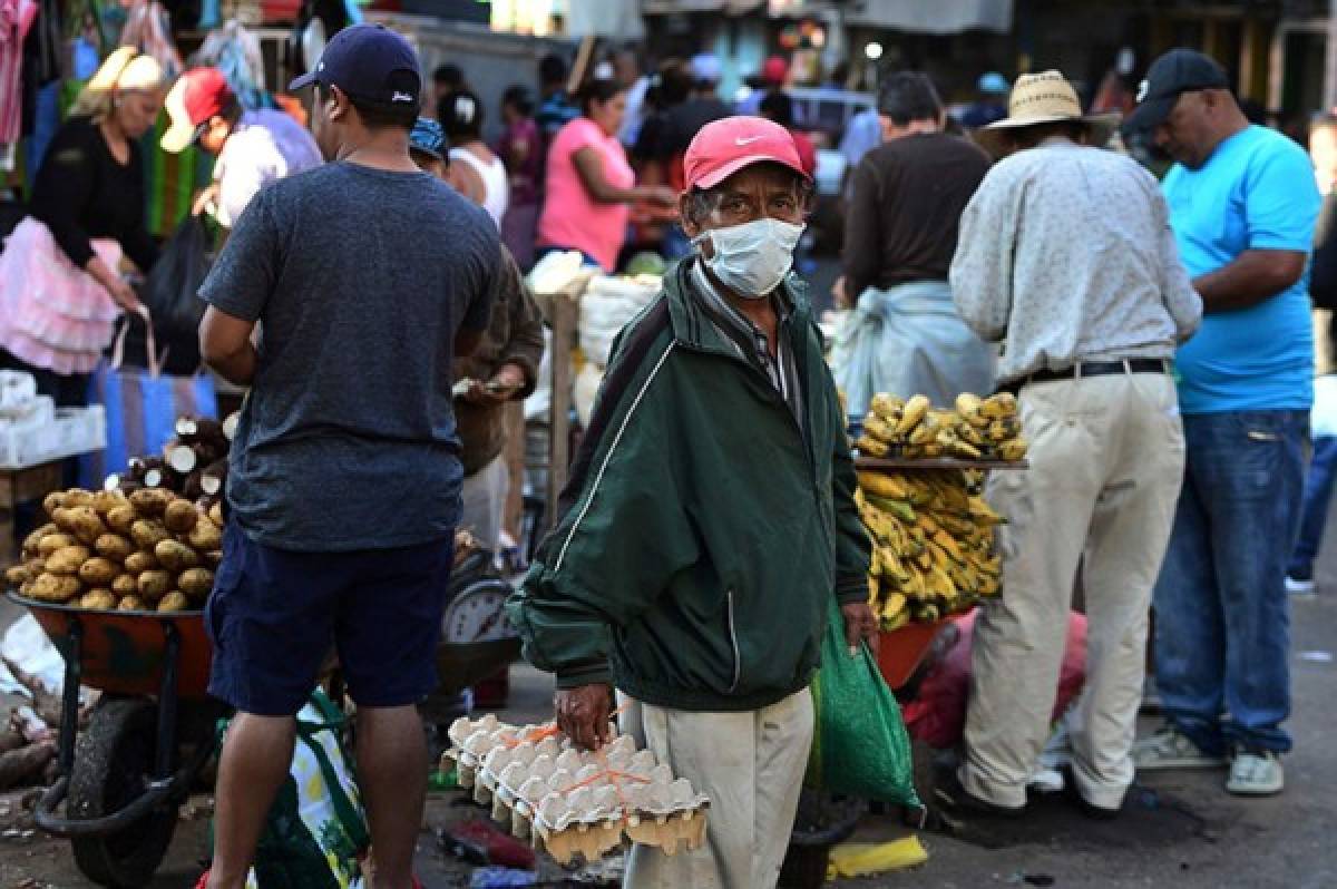 Tegucigalpa con colonias militarizadas, mercados con gente y calles desoladas