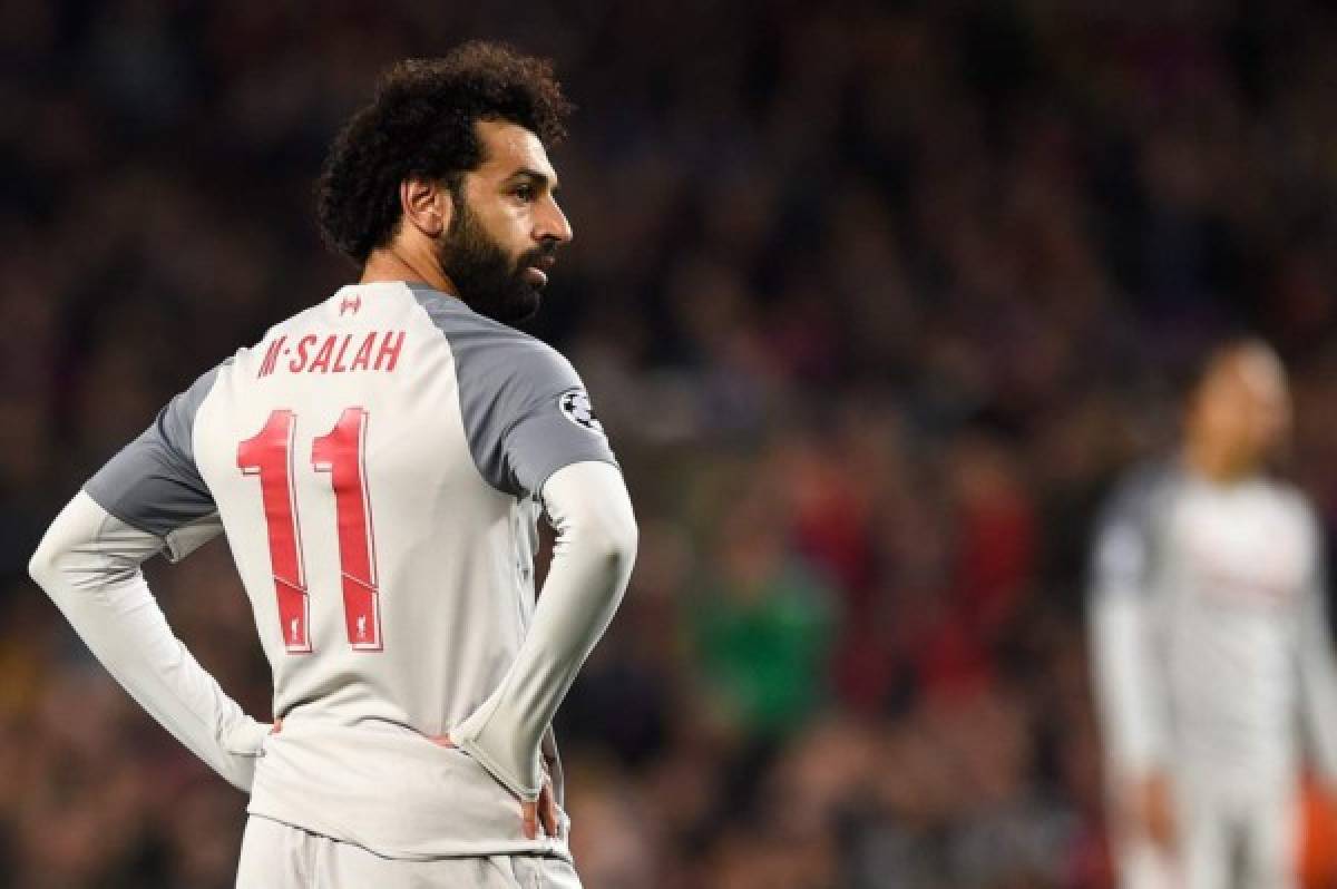 Liverpool's Egyptian forward Mohamed Salah reacts during the UEFA Champions League semi-final first leg football match between FC Barcelona and Liverpool at the Camp Nou stadium in Barcelona on May 1, 2019. (Photo by Josep LAGO / AFP)
