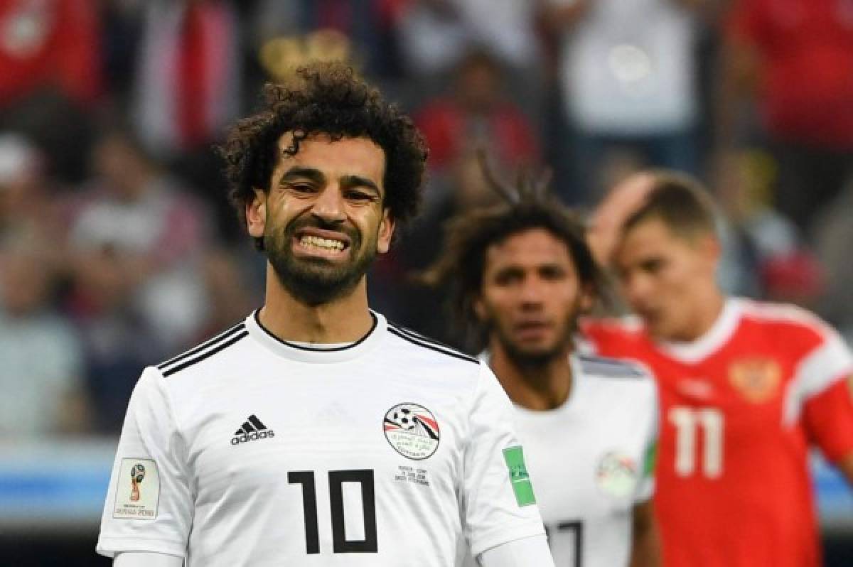 Egypt's forward Mohamed Salah reacts during the Russia 2018 World Cup Group A football match between Russia and Egypt at the Saint Petersburg Stadium in Saint Petersburg on June 19, 2018. / AFP PHOTO / Paul ELLIS / RESTRICTED TO EDITORIAL USE - NO MOBILE PUSH ALERTS/DOWNLOADS