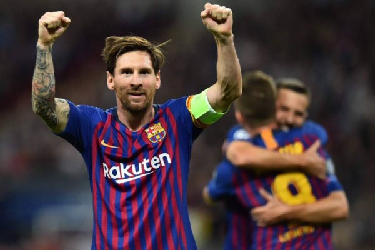 Barcelona's Argentinian striker Lionel Messi celebrates after scoring their third goal during the Champions League group B football match match between Tottenham Hotspur and Barcelona at Wembley Stadium in London, on October 3, 2018. / AFP PHOTO / Glyn KIRK