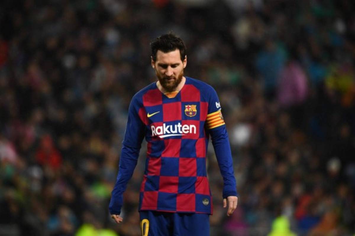 Barcelona's Argentine forward Lionel Messi walks on the pitch during the Spanish League football match between Real Madrid and Barcelona at the Santiago Bernabeu stadium in Madrid on March 1, 2020. (Photo by GABRIEL BOUYS / AFP)
