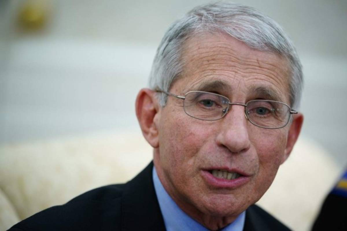 (FILES) In this file photo taken on April 29, 2020 Dr. Anthony Fauci, director of the National Institute of Allergy and Infectious Diseases, speaks during a meeting with US President Donald Trump and Louisiana Governor John Bel Edwards in the Oval Office of the White House in Washington, DC. - The NFL and major US college football programs probably must look at a 'bubble' format to conduct a season due to the global coronavirus pandemic, Fauci warned on June 18, 2020. (Photo by MANDEL NGAN / AFP)