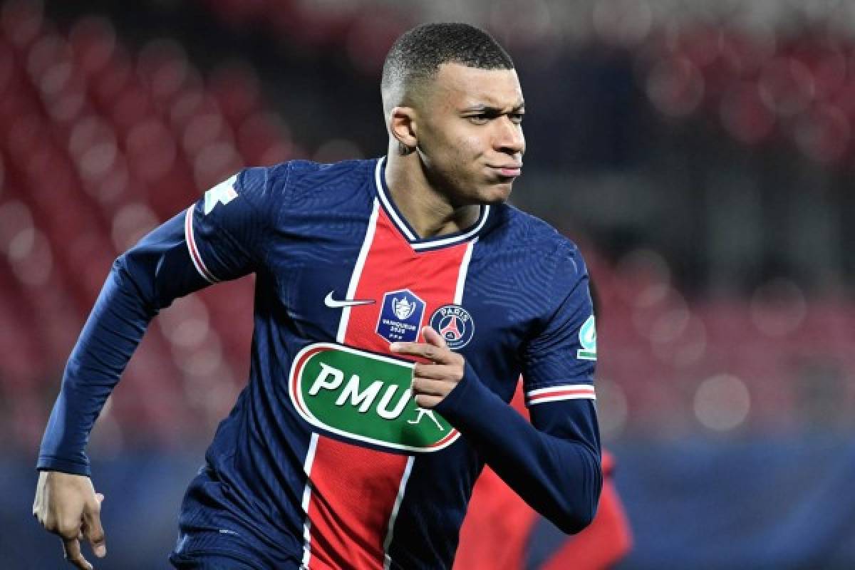 Paris Saint-Germain's French forward Kylian Mbappe celebrates after scoring the opener during the French Cup round-of-16 football match between Brest FC (Stade Brestois 29) and Paris Saint-Germain (PSG) at The Francis Le Ble Stadium in Brest, north-western France on March 6, 2021. (Photo by Fred TANNEAU / AFP)