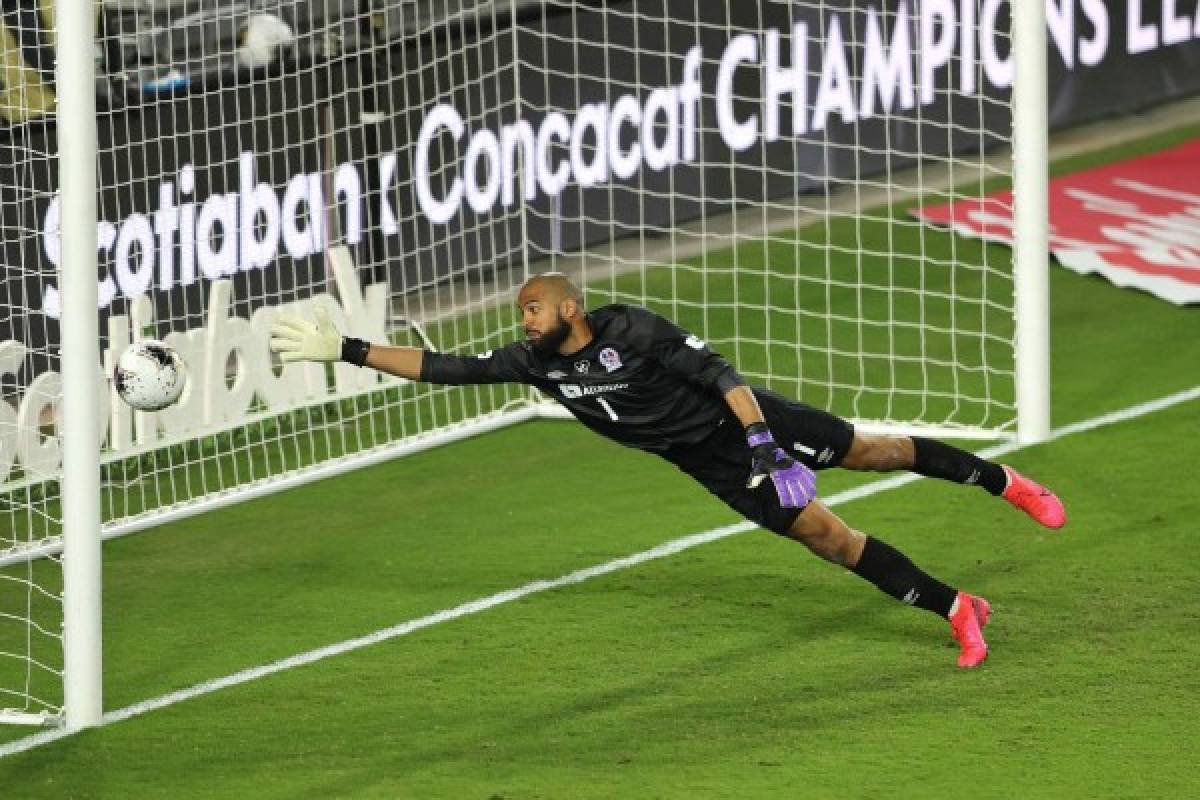 ORLANDO, FL - DECEMBER 19: Edrick Menjivar #1 of CD Olimpia concedes a goal during the CONCACAF Champions League semifinal game against Tigres UANL at Exploria Stadium on December 19, 2020 in Orlando, Florida. Alex Menendez/Getty Images/AFP== FOR NEWSPAPERS, INTERNET, TELCOS & TELEVISION USE ONLY ==
