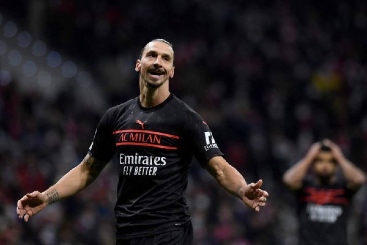 AC Milan's Swedish forward Zlatan Ibrahimovic reacts during the UEFA Champions League first round Group B football match between Club Atletico de Madrid and AC Milan at the Wanda Metropolitano stadium in Madrid on November 24, 2021. (Photo by OSCAR DEL POZO / AFP)