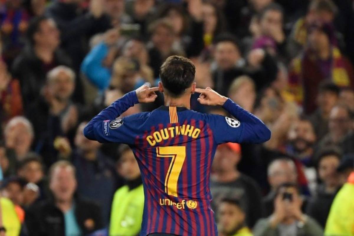 Barcelona's Brazilian midfielder Philippe Coutinho celebrates scoring his team's third goal during the UEFA Champions League quarter-final second leg football match between Barcelona and Manchester United at the Camp Nou stadium in Barcelona on April 16, 2019. (Photo by LLUIS GENE / AFP)