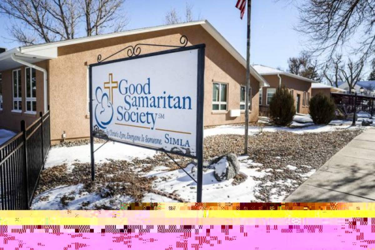 SIMLA, CO - DECEMBER 30: A sign for the Good Samaritan Society sits outside the nursing home on December 30, 2020 in Simla, Colorado. A Colorado National Guard soldier who was deployed at an ongoing COVID outbreak at the nursing home is the first person in the United States to have tested positive for a more contagious COVID-19 variant. Michael Ciaglo/Getty Images/AFP