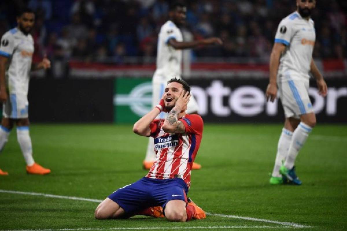 Atletico Madrid's Spanish midfielder Saul Niguez reacts during the UEFA Europa League final football match between Olympique de Marseille and Club Atletico de Madrid at the Parc OL stadium in Decines-Charpieu, near Lyon on May 16, 2018. / AFP PHOTO / FRANCK FIFE