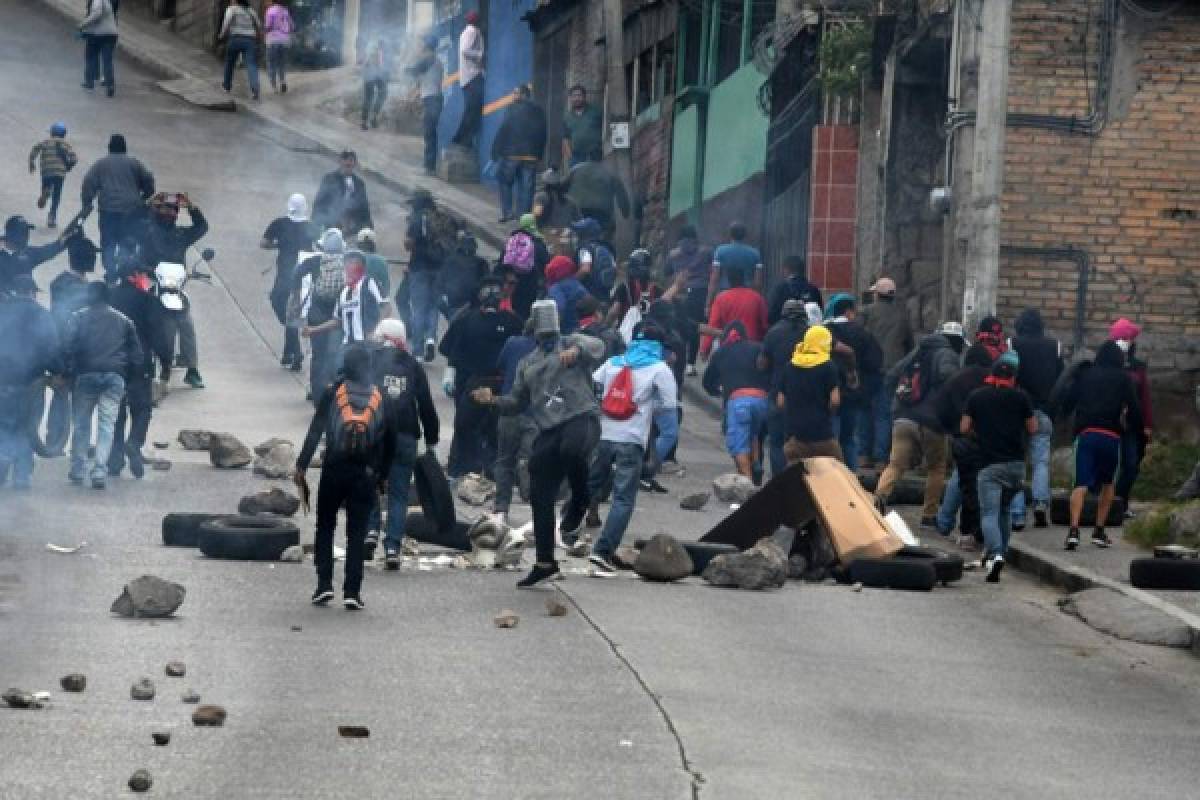 Bloqueos de calles y enfrentamientos dejan protestas en Honduras