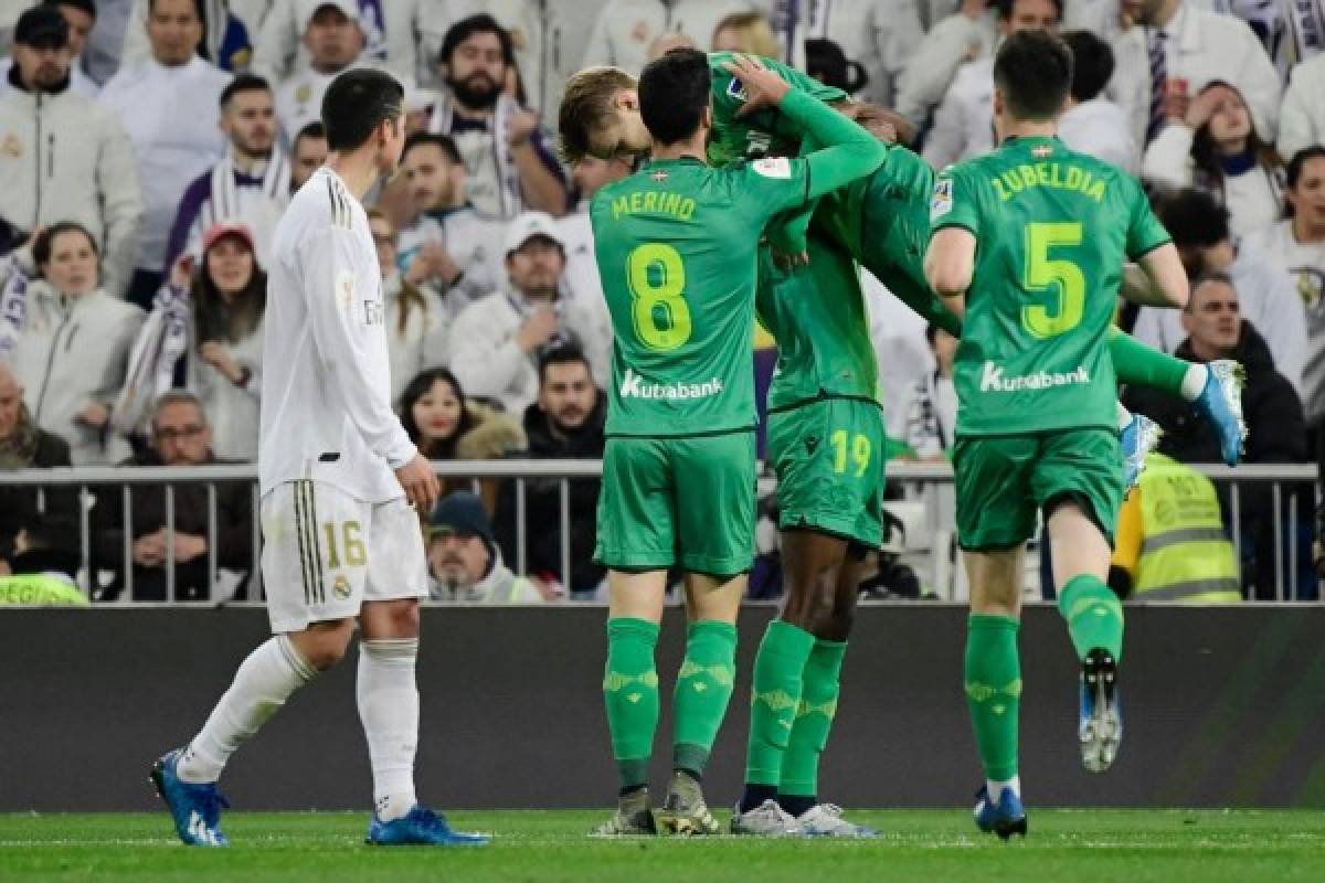 Real Sociedad's Norwegian midfielder Martin Odegaard celebrates his goal during the Spanish Copa del Rey (King's Cup) quarter-final football match Real Madrid CF against Real Sociedad at the Santiago Bernabeu stadium in Madrid on February 06, 2020. (Photo by JAVIER SORIANO / AFP)