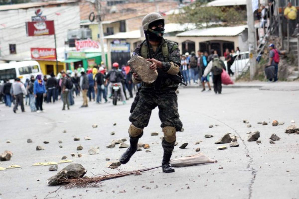 Bloqueos de calles y enfrentamientos dejan protestas en Honduras