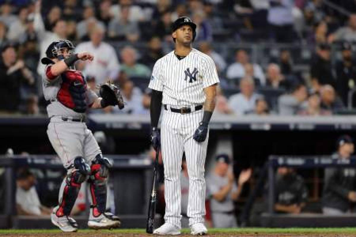 NEW YORK, NEW YORK - OCTOBER 09: Aaron Hicks #31 of the New York Yankees reacts after striking out in the eighth inning against the Boston Red Sox during Game Four American League Division Series at Yankee Stadium on October 09, 2018 in the Bronx borough of New York City. Elsa/Getty Images/AFP