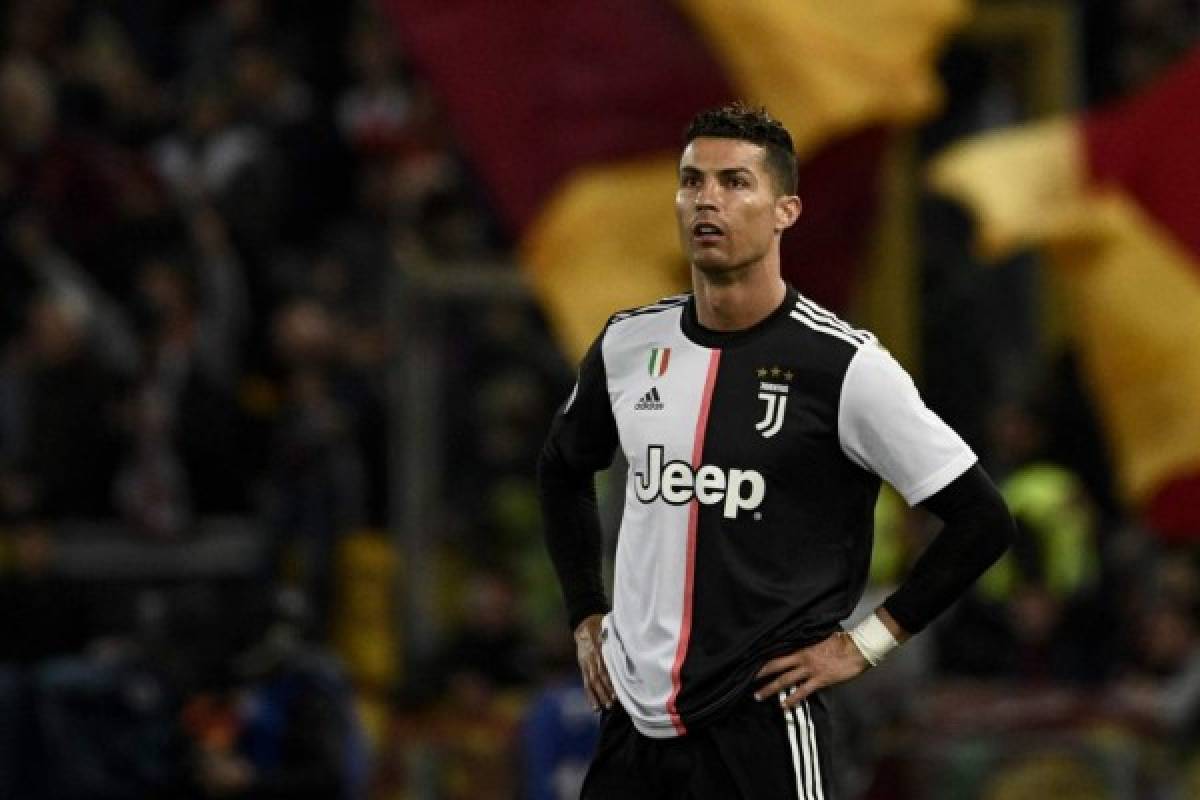 (FILES) In this file photo taken on May 12, 2019 Juventus' Portuguese forward Cristiano Ronaldo reacts during the Italian Serie A football match between AS Roma and Juventus Turin at the Olympic stadium in Rome. - Juventus star Cristiano Ronaldo will not face any charges over an alleged rape in Nevada a decade ago, prosecutors said July 22, 2019. (Photo by Filippo MONTEFORTE / AFP)