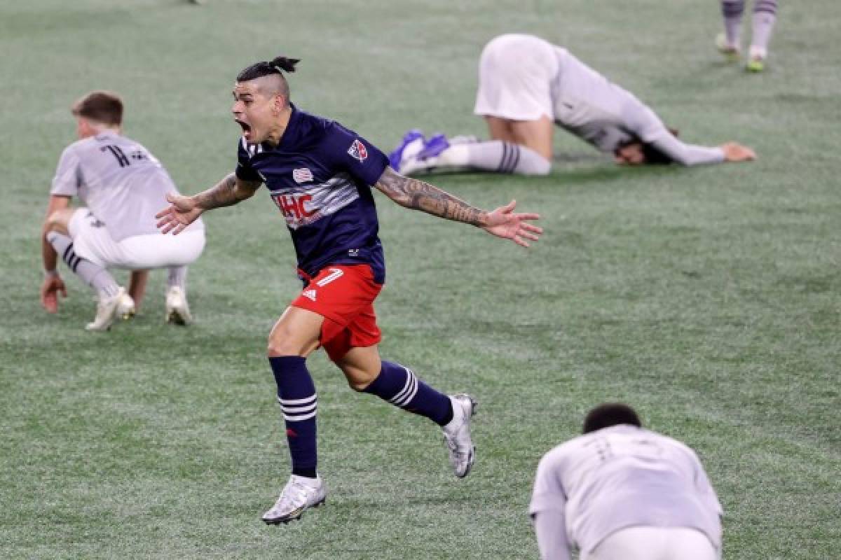 FOXBOROUGH, MASSACHUSETTS - NOVEMBER 20: Gustavo Bou #7 of New England Revolution celebrates after scoring the game winning goal against the Montreal Impact during second half of the Play-In Round match of the MLS Cup Playoffs at Gillette Stadium on November 20, 2020 in Foxborough, Massachusetts. The Revolution defeat the Impact 2-1. Maddie Meyer/Getty Images/AFP