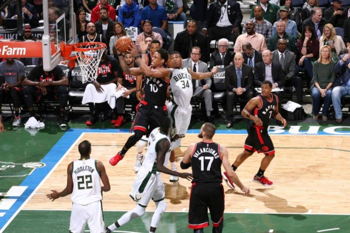 Milwaukee, WI - APRIL 27: DeMar DeRozan #10 of the Toronto Raptors goes up for a shot against the Milwaukee Bucks during Game Six of the Eastern Conference Quarterfinals of the 2017 NBA Playoffs on April 27, 2017 at the BMO Harris Bradley Center in Milwaukee, Wisconsin. NOTE TO USER: User expressly acknowledges and agrees that, by downloading and/or using this photograph, user is consenting to the terms and conditions of the Getty Images License Agreement. Mandatory Copyright Notice: Copyright 2017 NBAE Nathaniel S. Butler/NBAE via Getty Images/AFP