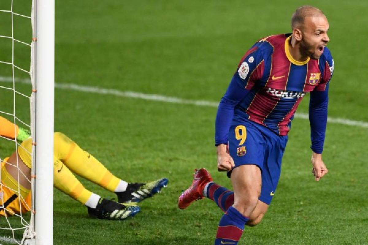 Barcelona's Danish forward Martin Braithwaite celebrates scoring his team's third goal during Spanish Copa del Rey (King's Cup) semi-final second leg football match between FC Barcelona and Sevilla FC at the Camp Nou stadium in Barcelona on March 3, 2021. (Photo by Josep LAGO / AFP)