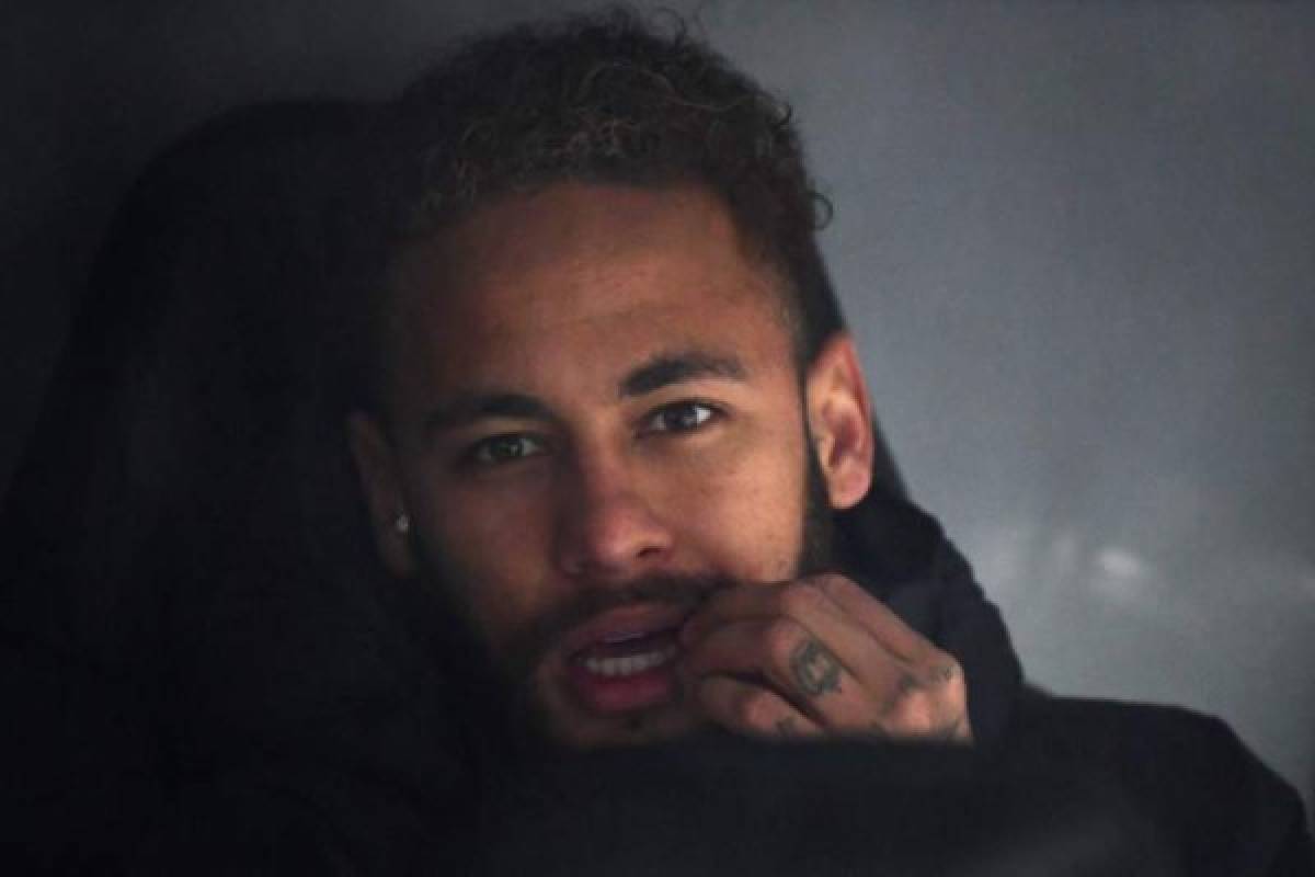 Paris Saint-Germain's Brazilian forward Neymar sits on the bench during the UEFA Champions League group A football match against Paris Saint-Germain FC at the Santiago Bernabeu stadium in Madrid on November 26, 2019. (Photo by GABRIEL BOUYS / AFP)