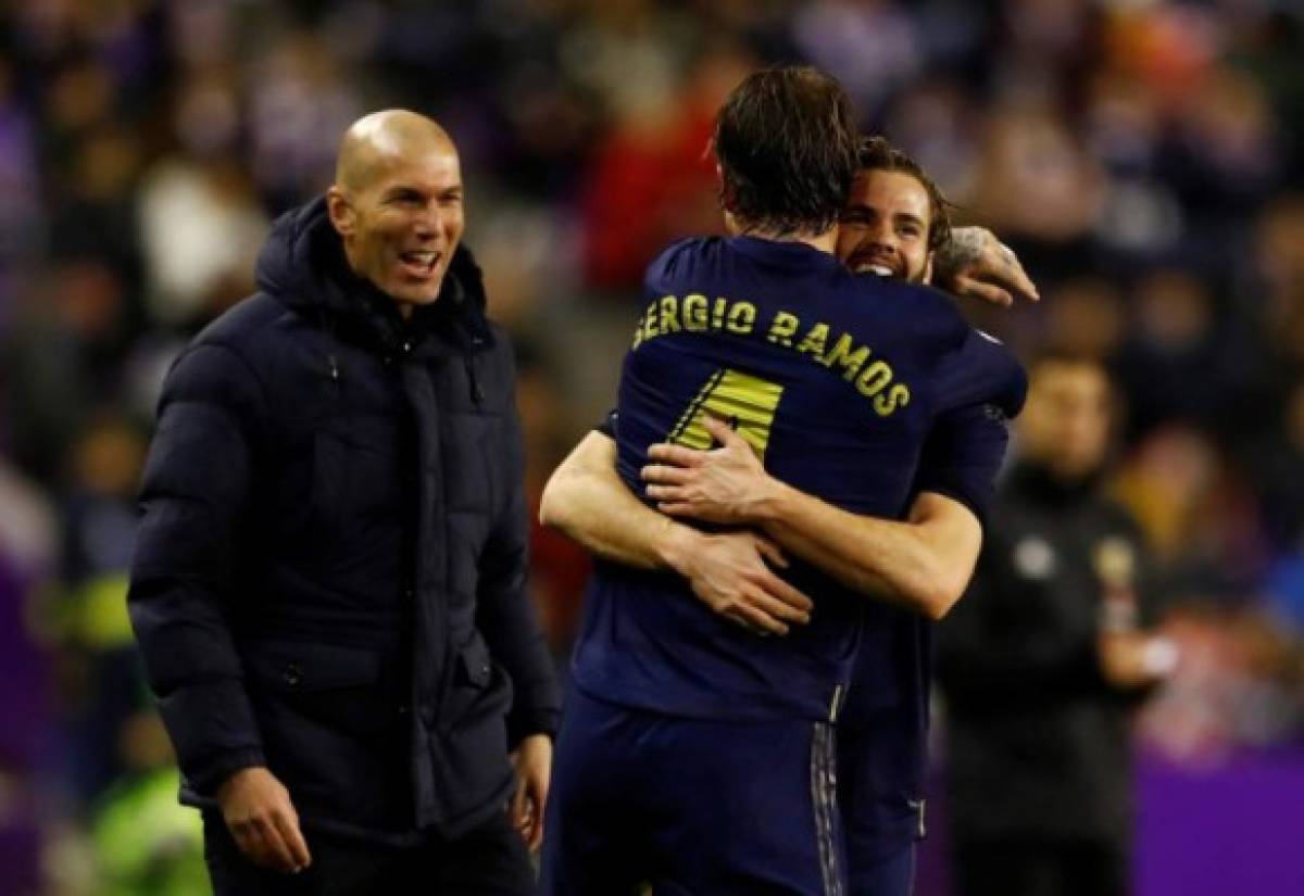Foto del domingo de Nacho celebrando el gol del Real Madrid junto a Sergio Ramos y Zinedine Zidane.Ene 26, 2020 REUTERS/Juan Medina