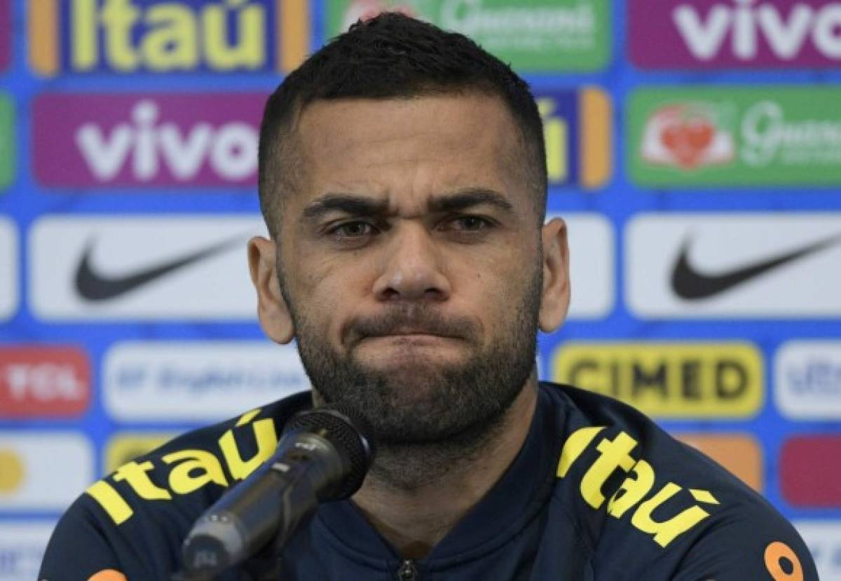Brazil's defender Dani Alves gestures during a press conference in Salvador, state of Bahia, Brazil on June 16, 2019 ahead of the Copa America Group A football match against Venezuela. (Photo by JUAN MABROMATA / AFP)