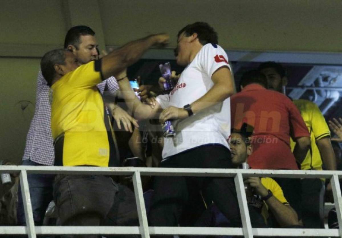En fotos: Así fue la pelea entre aficionado del Olimpia y Real España en el palco