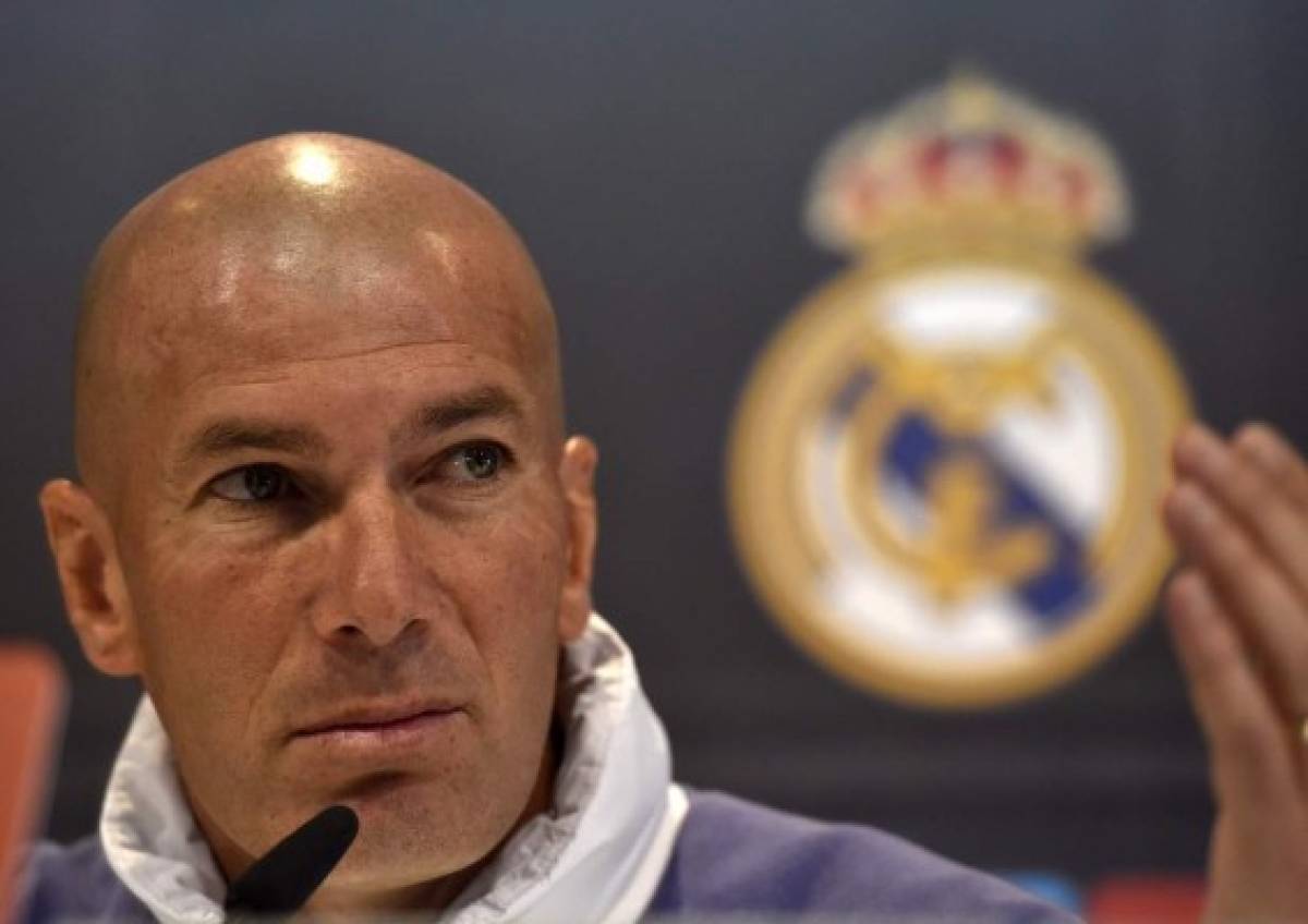 Real Madrid's French coach Zinedine Zidane gestures during a press conference at Valdebebas training ground in Madrid on April 22, 2017, on the eve of the Spanish League Clasico football match Real Madrid CF vs FC Barcelona. / AFP PHOTO / GERARD JULIEN