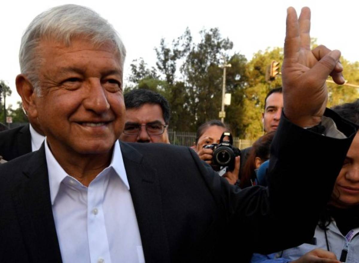 Mexico's presidential candidate Andres Manuel Lopez Obrador for the 'Juntos haremos historia' party, gestures after voting during general elections, in Mexico City, on July 1, 2018.Sick of endemic corruption and horrific violence fueled by the country's powerful drug cartels, Mexicans go to the polls seeking for any alternative to the two parties that have governed for nearly a century: the ruling Institutional Revolutionary Party (PRI) and the conservative National Action Party (PAN). / AFP PHOTO / ULISES RUIZ