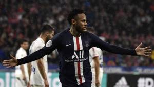 Paris Saint-Germain's Brazilian forward Neymar celebrates after scoring a goal during the French L1 football match between Olympique Lyonnais (OL) and Paris Saint-Germain (PSG) at the Groupama stadium on September 22, 2019 in Decines-Charpieu, near Lyon. (Photo by JEFF PACHOUD / AFP)