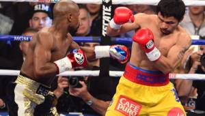 En la 'Pelea del Siglo' se impuso el estilo defensivo de Mayweather y ante un Pacquiao que peleó lesionado. Foto AFP