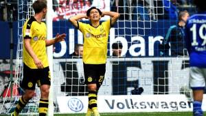 Shinji Kagawa se lamenta una acción de gol errada frente a los azules. (AFP)