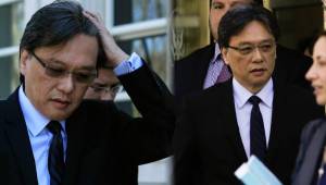 Eduardo Li al salir de los tribunales en compañía de su cuerpo de abogados.