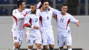 Los jugadores de Irán celebraron con euforia el triunfo ante Chile. (Fotos: AFP)