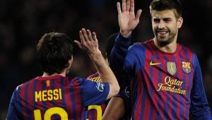 Gerard Piqué y Lionel Messi comparten vestuario en el Barcelona de España.