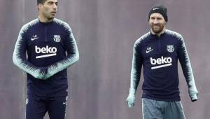 Suárez y Messi durante el entrenamiento del Barcelona antes de viajar a Italia.